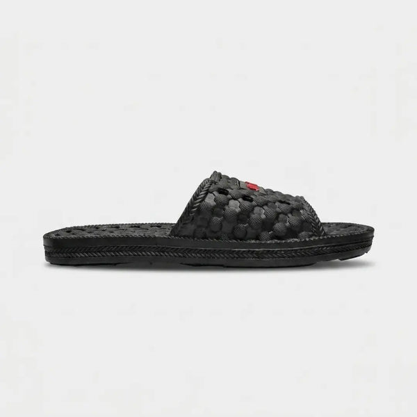 Junction Sole black EVA honeycomb bathroom slippers side profile, anti-slip shower slides for men and women, lightweight quick-dry footwear for home use in Pakistan.