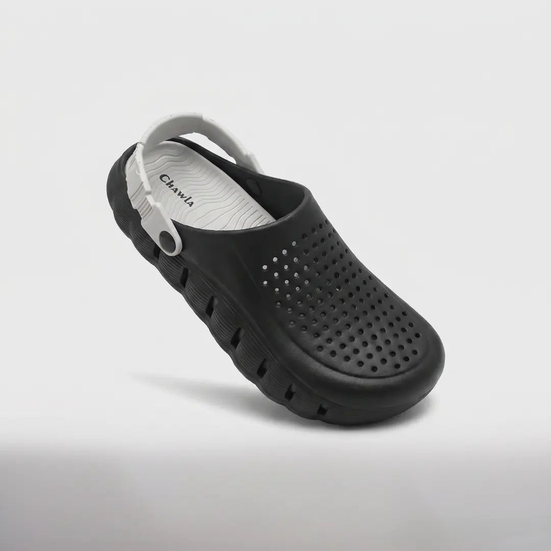 JunctionSole black clog with white heel strap angled studio shot
