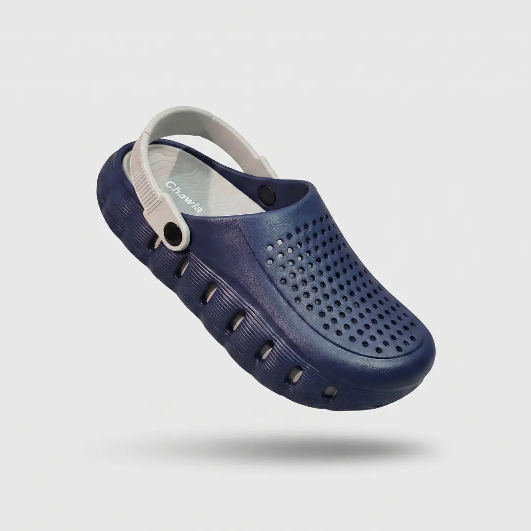 JunctionSole navy blue EVA clog floating angled studio shot with beige heel strap