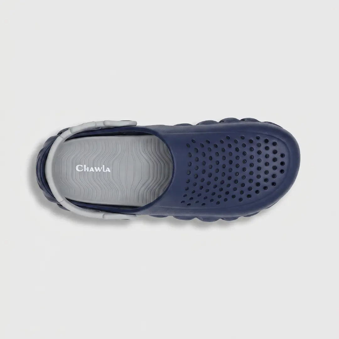 JunctionSole navy blue clog top view showing breathable holes and cushioned insole