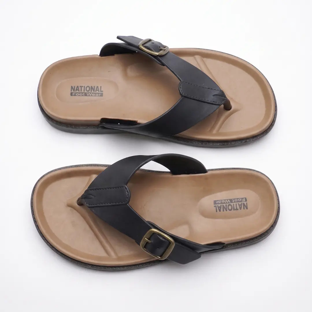 A pair of black thong sandals with adjustable buckle straps and tan footbeds, shown on a plain white background. The brand name 'National Footwear' is visible on the insole.