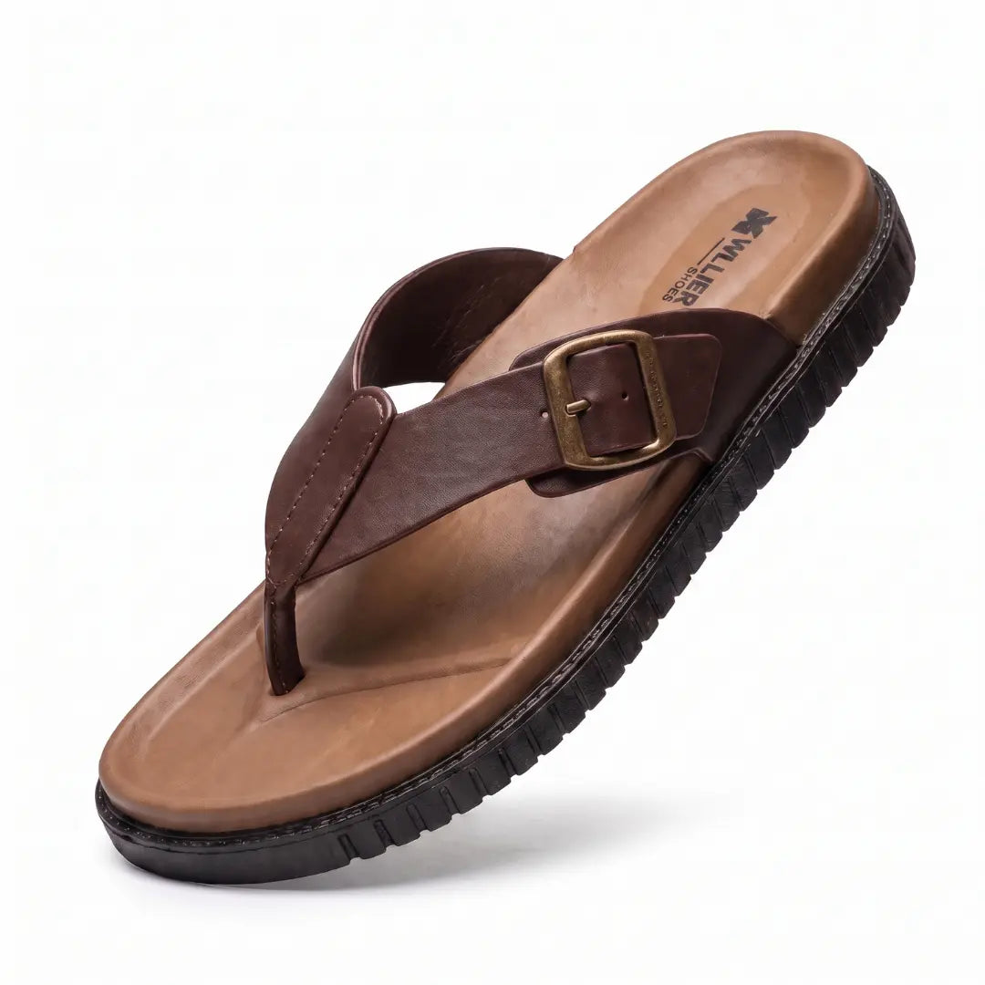 Junction Sole brown comfort slippers for men showing adjustable buckle strap and cushioned tan footbed, perfect for indoor and outdoor use.