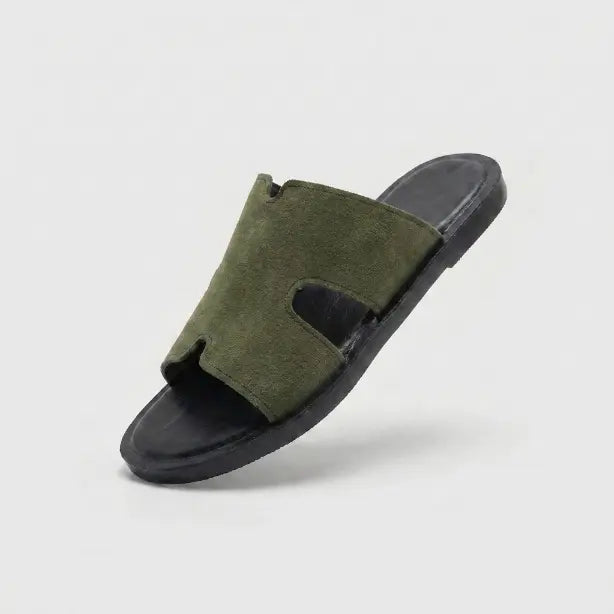 Junction Sole men's olive suede comfort slides shown at an angle, lightweight and flexible for everyday indoor and outdoor comfort.