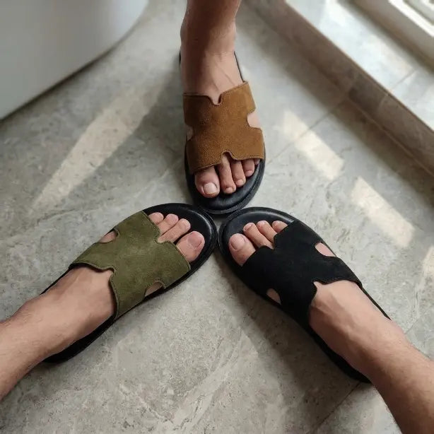 Junction Sole men's comfort suede slides in brown, olive and black, lightweight cushioned slippers for everyday indoor and outdoor wear in Pakistan.