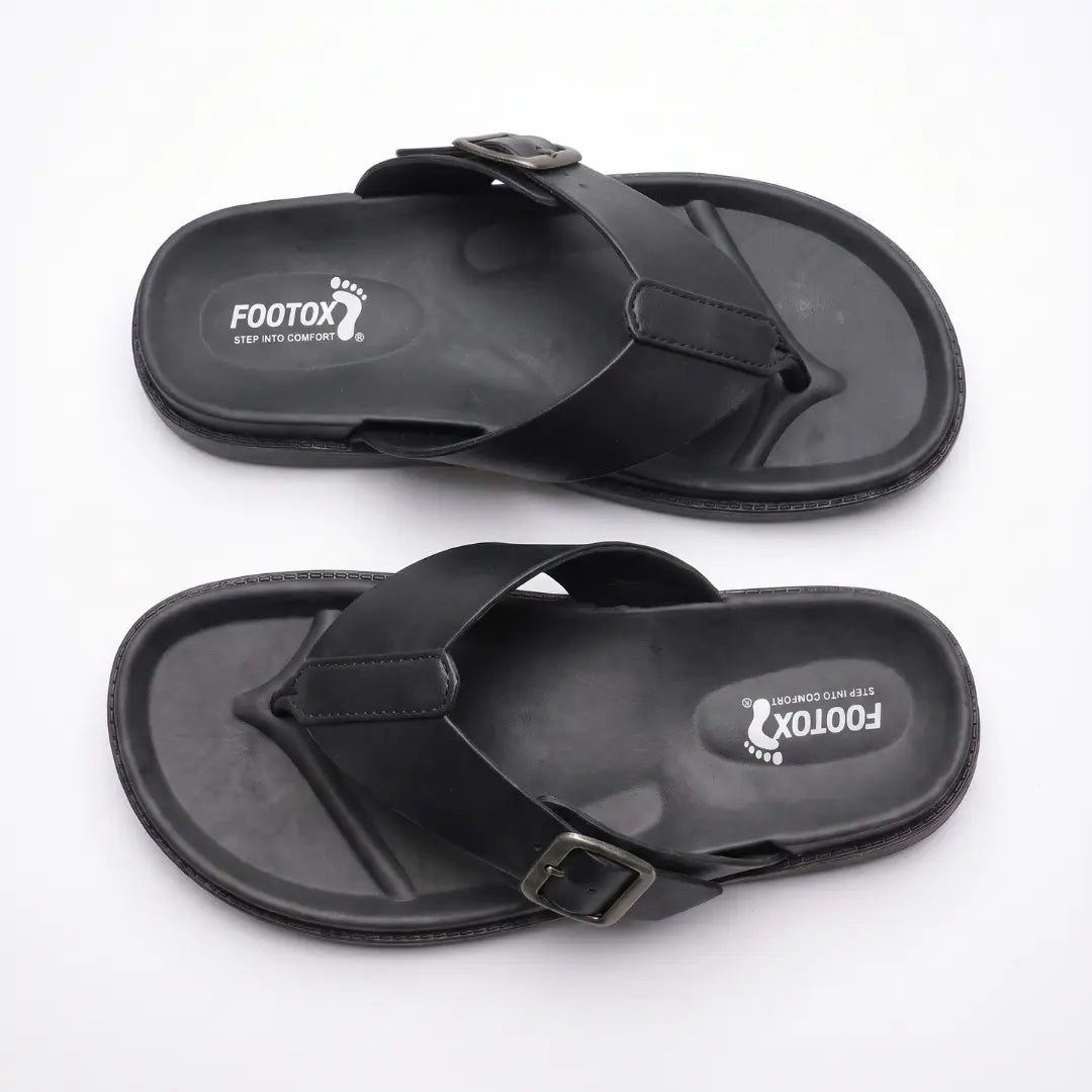Pair of Junction Sole men's full black comfort slides viewed from above, showing cushioned footbed and secure buckle closure.